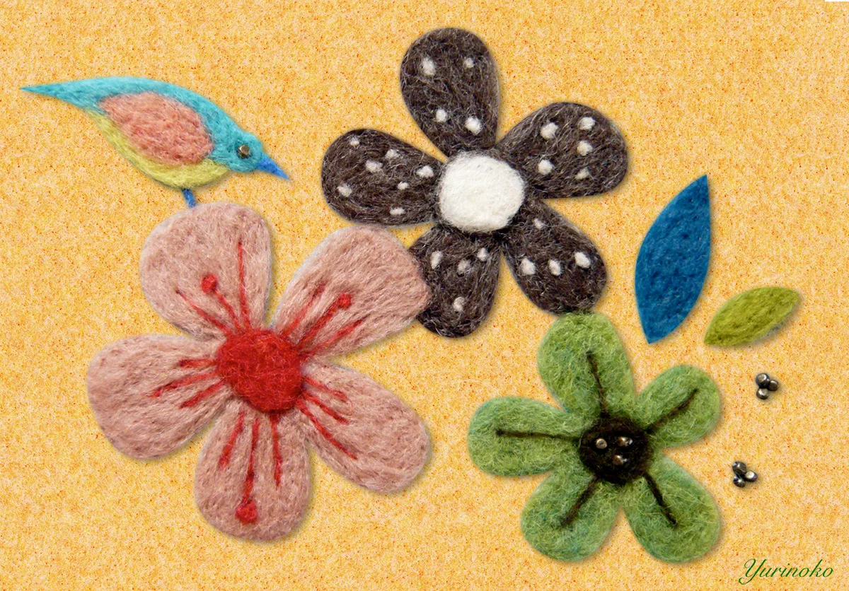 花と青い小鳥のフェルトのイラスト